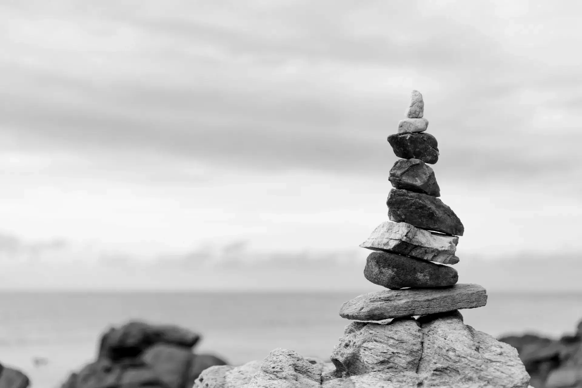 balanced-stone-pyramid-water-ocean-life-balance-concept